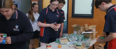 MacKillop students preparing snack packs